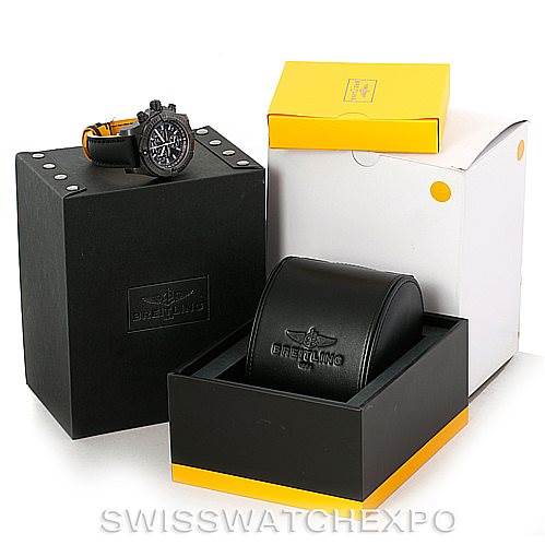 The image shows a Breitling Avenger M73390 Men's Stainless Steel Black Dial M73390 Men's Stainless Steel Black Dial watch, its black leather case, and branded packaging from various angles.