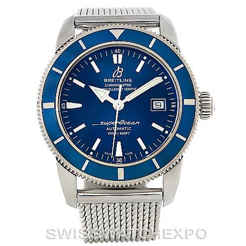 The image shows a front view of the Breitling Superocean A17320 Men's Stainless Steel Blue Dial A17320 Men's Stainless Steel Blue Dial watch, featuring a blue dial, date window, silver mesh strap, and rotating bezel.