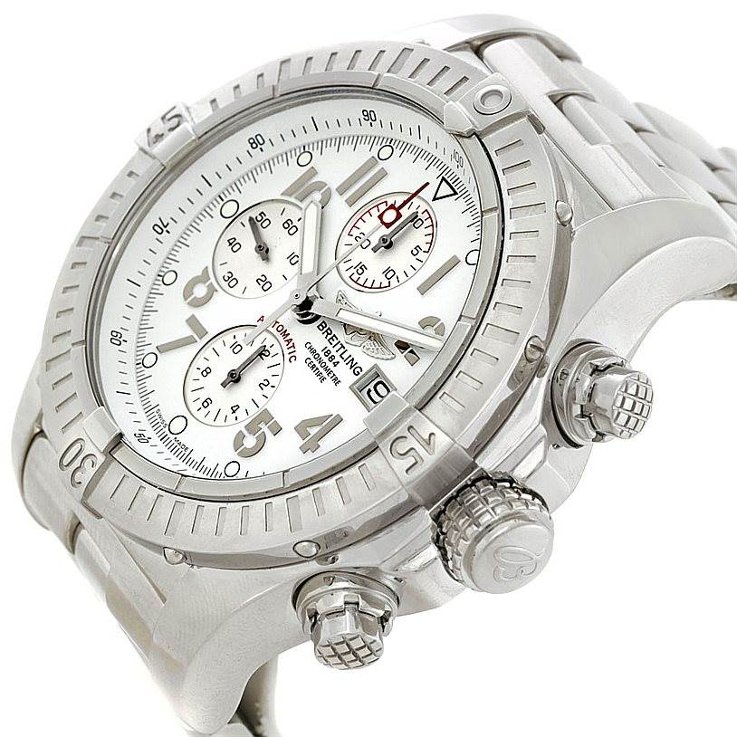 The image shows a close-up, angled view of the Breitling Avenger A13370 Men's Stainless Steel White Dial A13370 Men's Stainless Steel White Dial watch, highlighting the bezel, crown, pushers, and part of the bracelet.