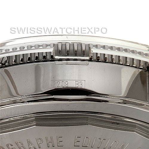 The image shows a close-up of the side view of a Breitling Superocean A23320 Men's Stainless Steel Black Dial A23320 Men's Stainless Steel Black Dial watch, highlighting part of the bezel and engravings on the case.