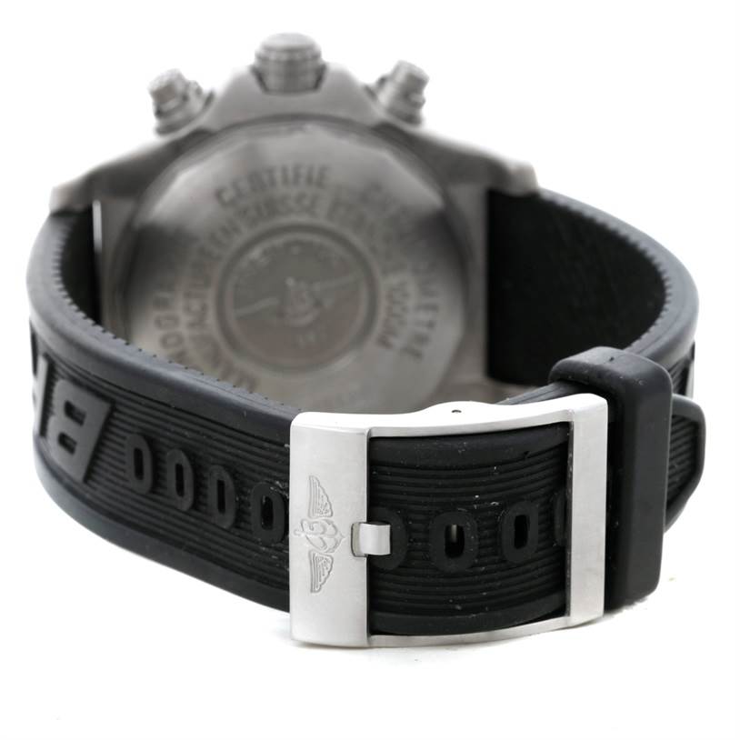 The image shows the back of the Breitling Avenger E73360 Men's Titanium Yellow Dial E73360 Men's Titanium Yellow Dial watch and its black rubber strap with a buckle.