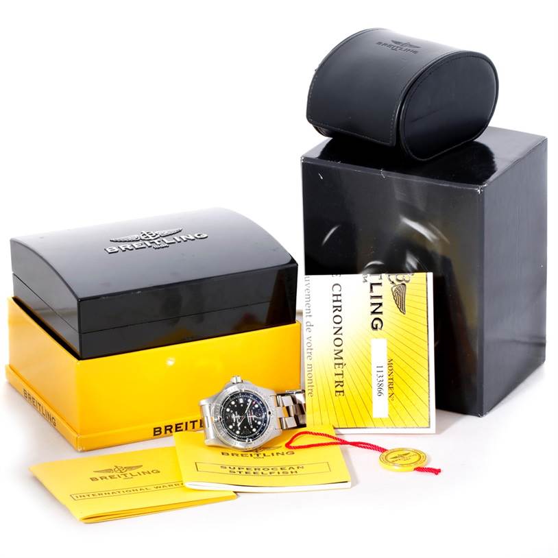 The image shows a Breitling Superocean A17390 Men's Stainless Steel Black Dial A17390 Men's Stainless Steel Black Dial watch, its box, manuals, and certification documents.