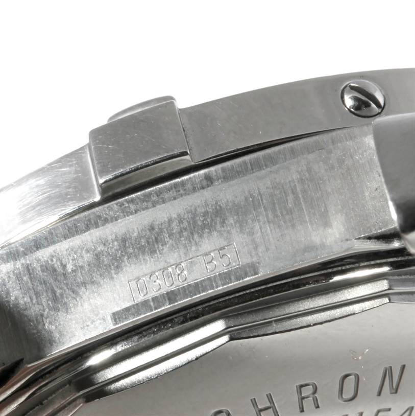 The image shows a close-up of the caseback and part of the bracelet of a Breitling Superocean A17390 Men's Stainless Steel Black Dial A17390 Men's Stainless Steel Black Dial watch.