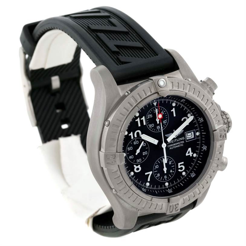 The Breitling Avenger E13360 Men's Titanium Black Dial E13360 Men's Titanium Black Dial watch is shown at an angle highlighting the face, bezel, pushers, and black rubber strap.