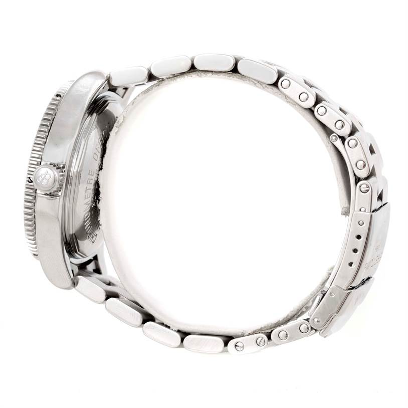 The image shows a side view of a Breitling Superocean A17364 Men's Stainless Steel Black Dial A17364 Men's Stainless Steel Black Dial watch, highlighting its case, crown, and metal bracelet.