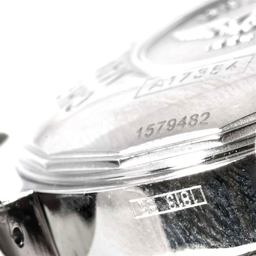 This image shows a close-up of the case back of a Breitling Superocean A17364 Men's Stainless Steel Black Dial A17364 Men's Stainless Steel Black Dial watch, highlighting the serial and model numbers.