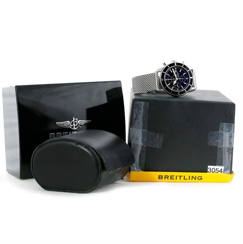 The Breitling Superocean A13320 Men's Stainless Steel Black Dial A13320 Men's Stainless Steel Black Dial watch is displayed with its packaging, including a black case, a box, and a travel pouch.