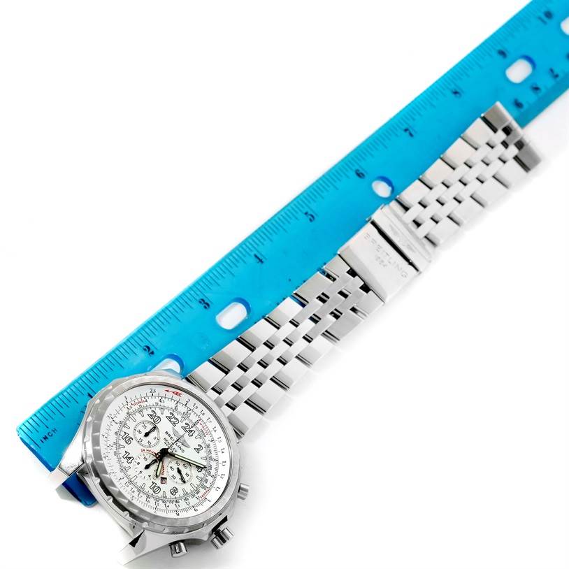 The image shows a top view of the Breitling Bentley A22362 Men's Stainless Steel White Dial A22362 Men's Stainless Steel White Dial model watch, including the face and metal bracelet, next to a blue ruler.