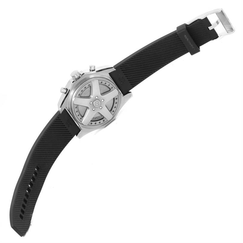 The image shows the back and strap of the Bentley model watch by Breitling, focusing on the case back and rubber strap.
