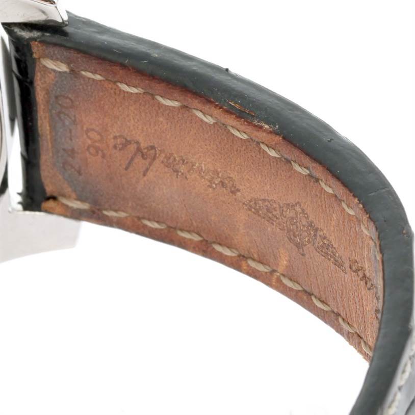 This image shows the interior of the leather strap and part of the silver case of a Bentley model by Breitling watch.