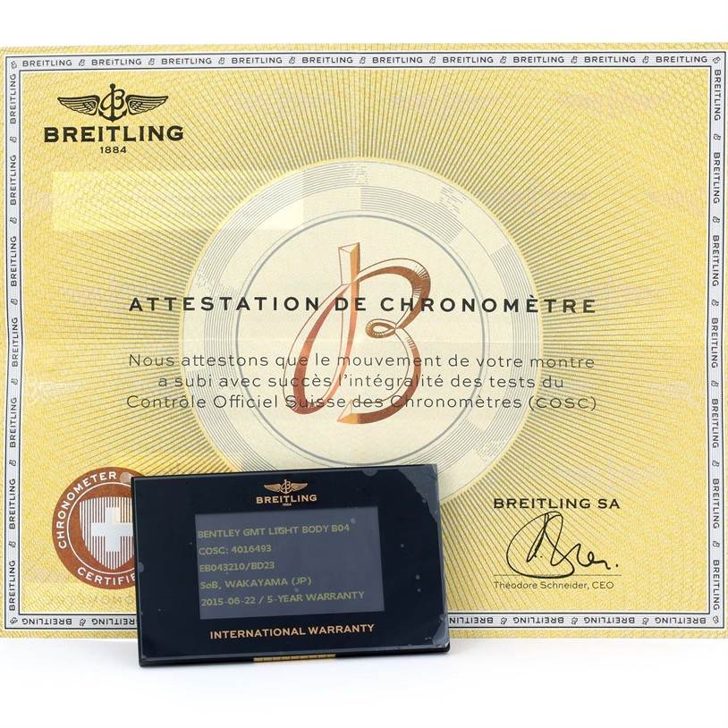 The image shows the Breitling Bentley EB0432 Men
s Titanium Black Dial EB0432 Men
s Titanium Black Dial model
s international warranty card and chronometer certificate, taken from the front.