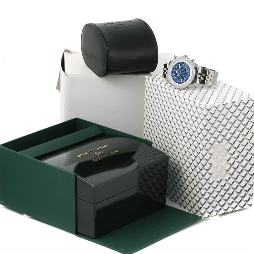 The image shows the Breitling Bentley A25362 Men's Stainless Steel Blue Dial A25362 Men's Stainless Steel Blue Dial watch at an angle with its bracelet extended, alongside its green and black branded boxes.