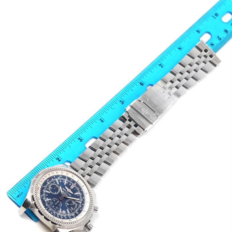 The Breitling Bentley A25362 Men's Stainless Steel Blue Dial A25362 Men's Stainless Steel Blue Dial watch is shown from an overhead angle with the face, bracelet, and clasp visible alongside a blue ruler.