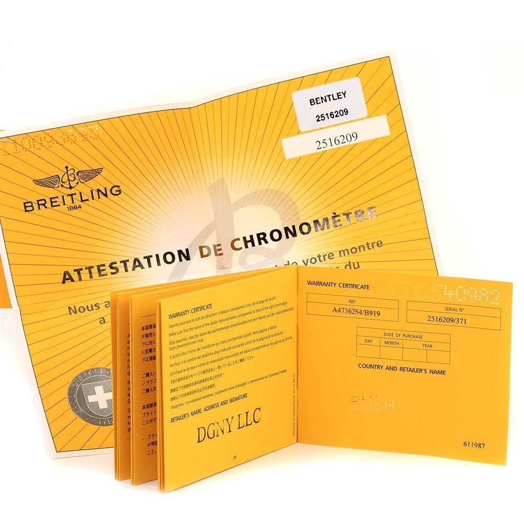 The image shows warranty documents and a certificate for the Bentley model by Breitling, placed at an angle.