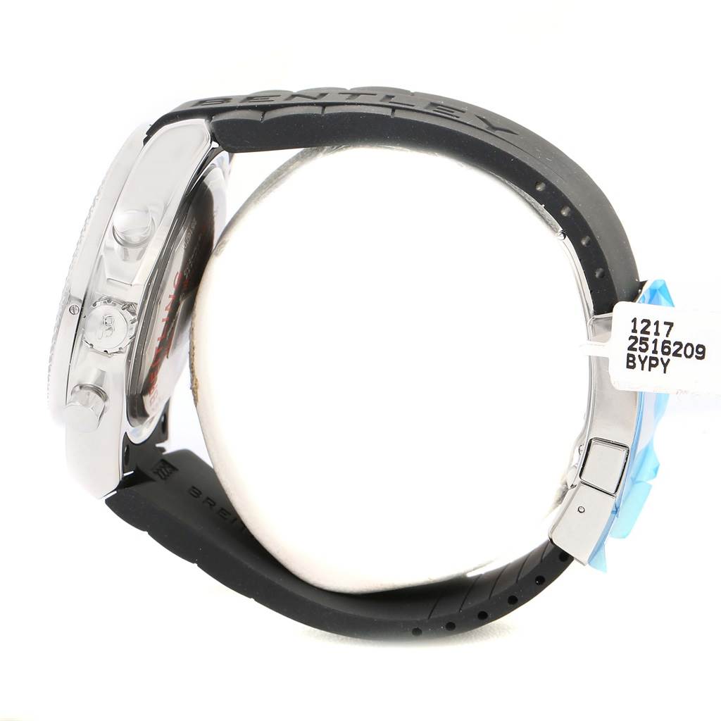 This side view of the Breitling Bentley A4736254/B919 Men's Stainless Steel Black Dial A4736254/B919 Men's Stainless Steel Black Dial watch shows its case, crown, pushers, and part of the black rubber strap.