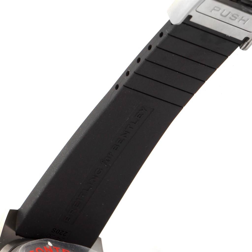 The image shows a side view of the black rubber strap and part of the clasp of a Breitling Bentley E27365 Men's Titanium Silver Dial E27365 Men's Titanium Silver Dial watch.