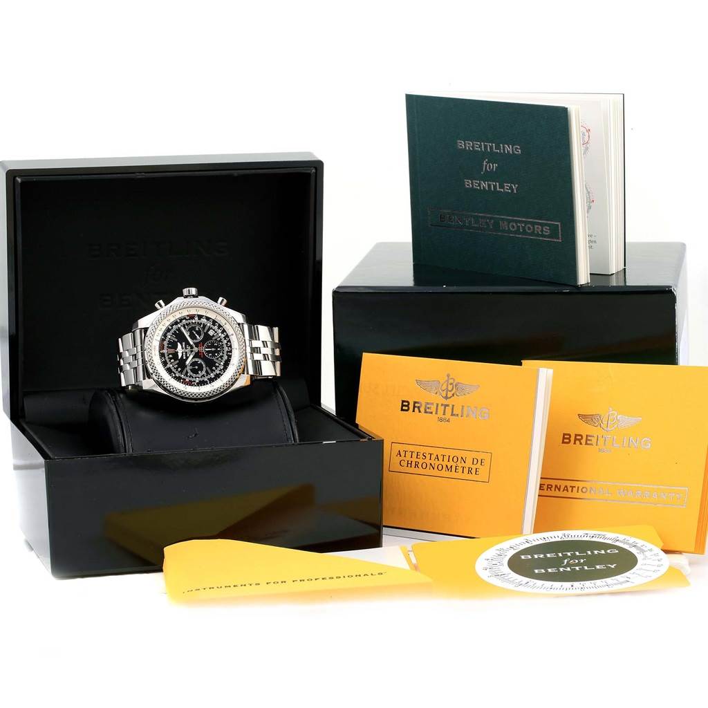 The image shows a Bentley model Breitling watch in its box, accompanied by booklets and accessories.