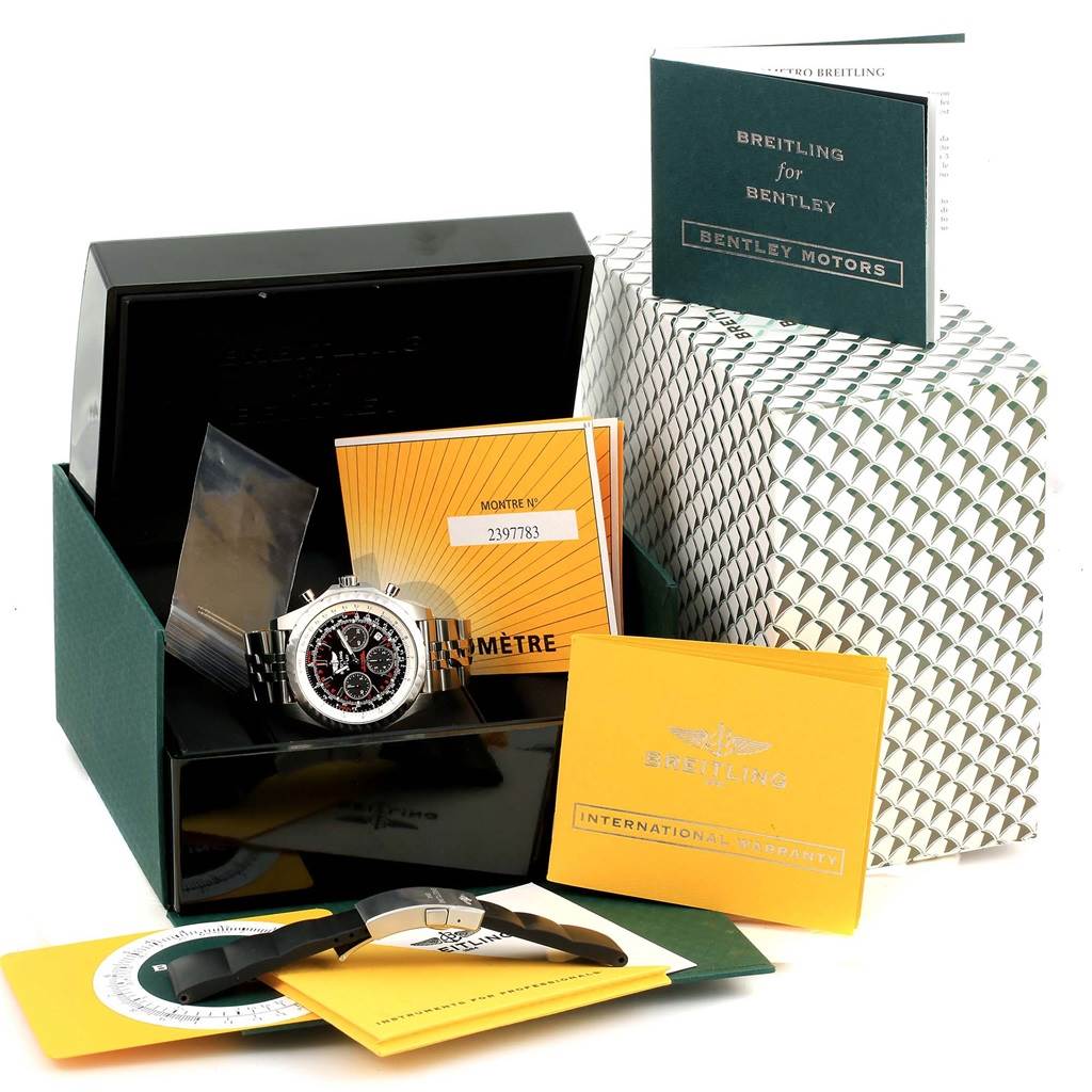 The image shows a Breitling Bentley A25365 Men
s Stainless Steel Black Dial A25365 Men
s Stainless Steel Black Dial watch with its box, warranty card, manual, and additional watch accessories from a frontal angle.