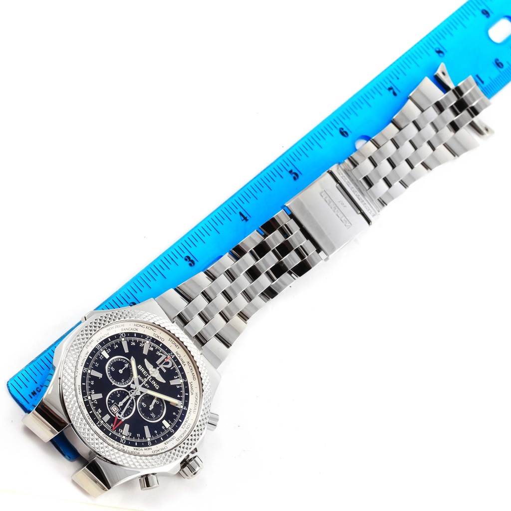 The image shows a Breitling Bentley A47362 Men's Stainless Steel Black Dial A47362 Men's Stainless Steel Black Dial watch from a top view, displaying the face and the metal bracelet next to a blue ruler.