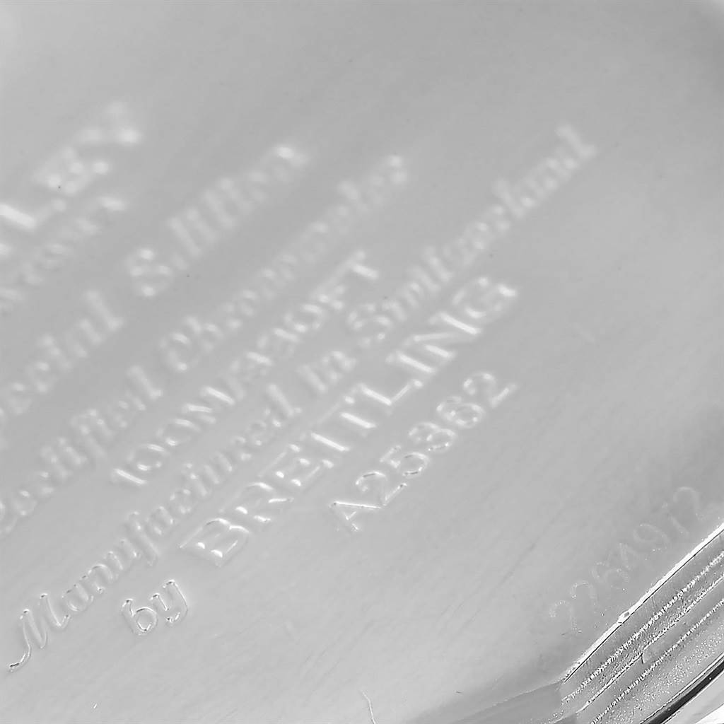 The image shows the engraved back case of a Bentley model Breitling watch, viewed at an angle to the engraved text.