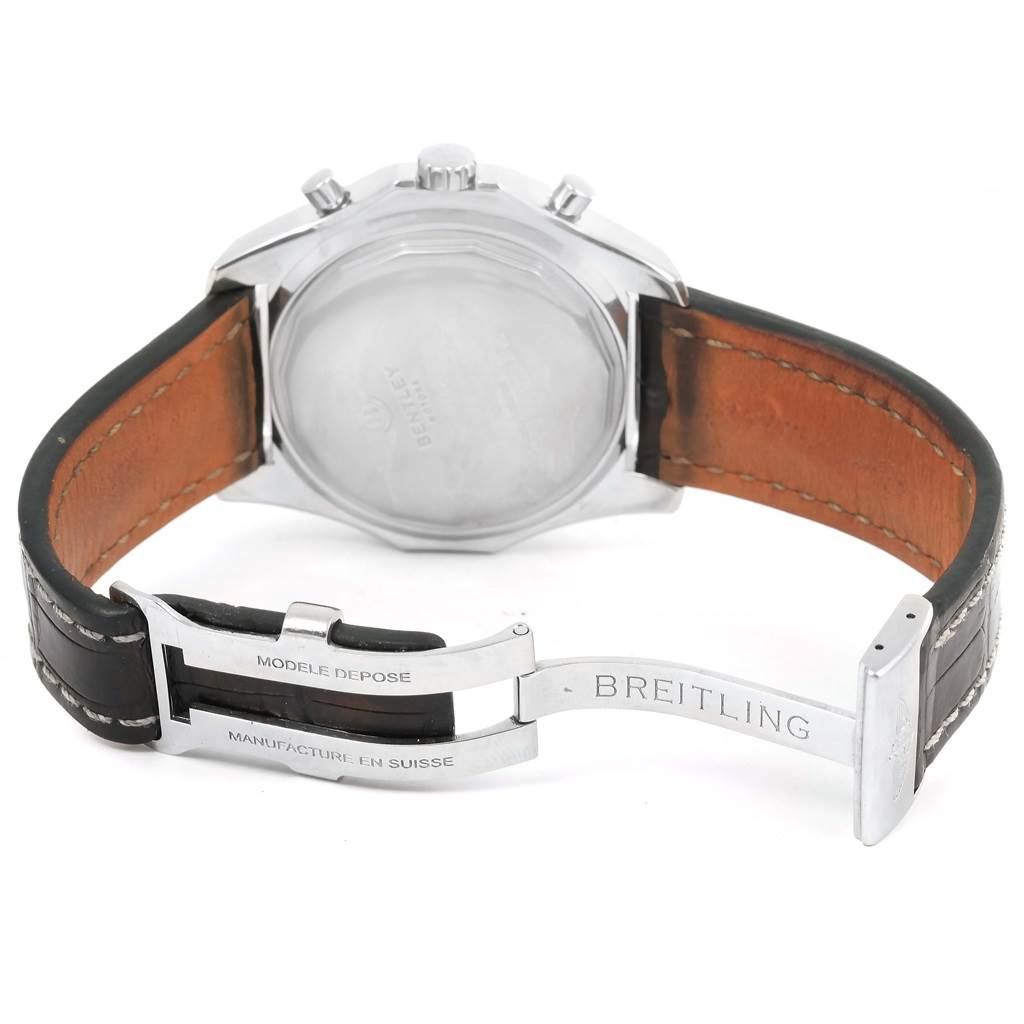 The image shows the backside of a Breitling Bentley A25362 Men
s Stainless Steel Black Dial A25362 Men
s Stainless Steel Black Dial model watch, highlighting its leather band and open clasp.