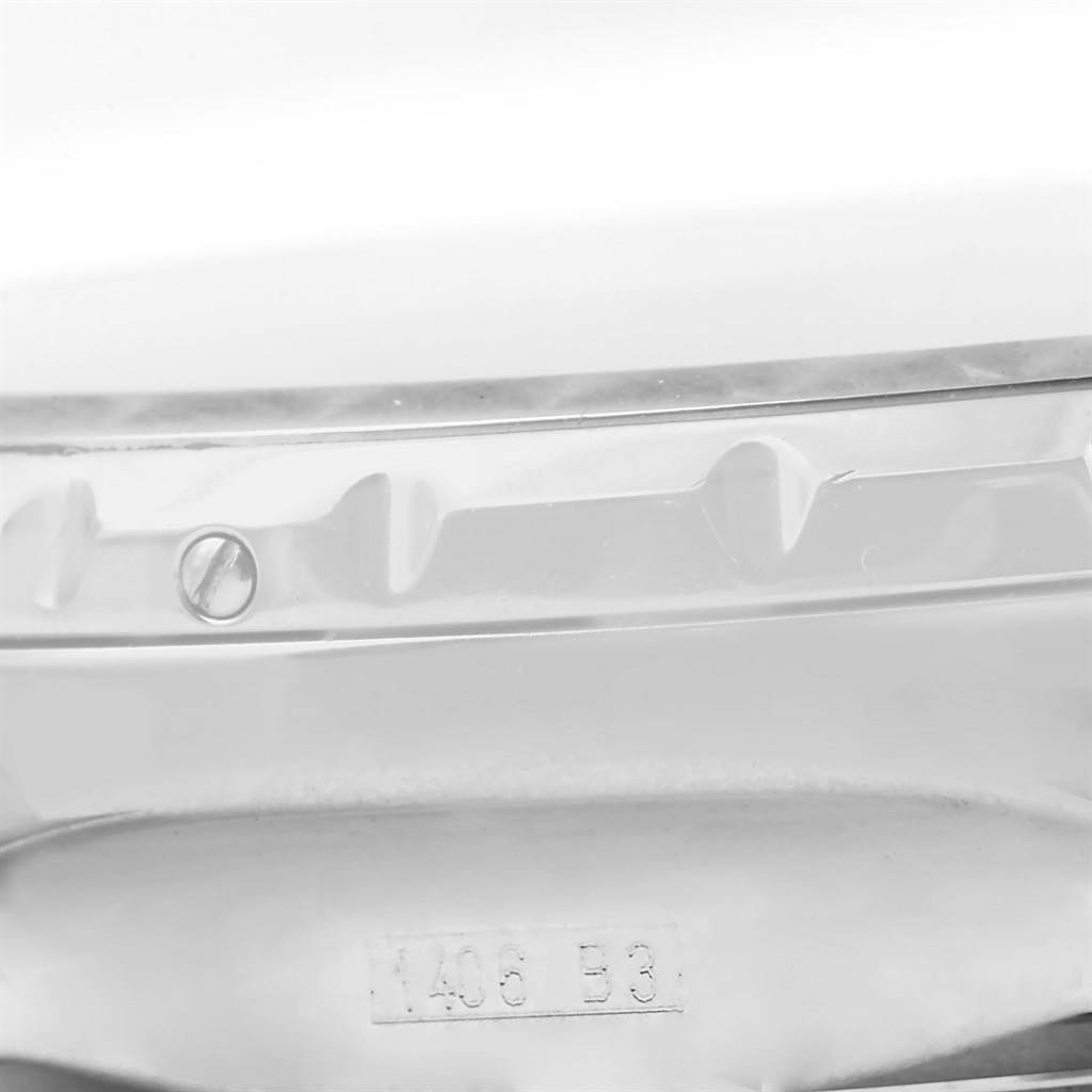 This close-up image shows the bezel and part of the serial number on a Bentley model by Breitling.