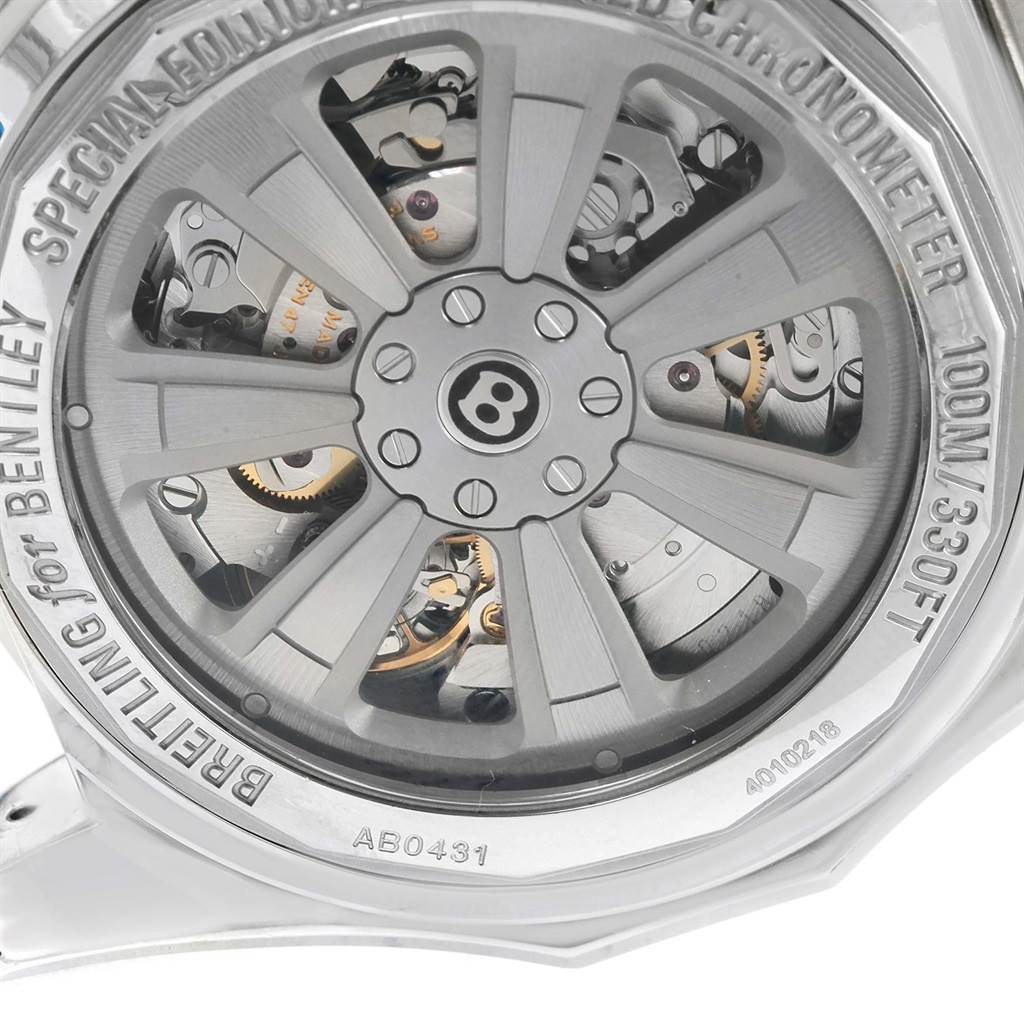 The image shows the back view of the Breitling Bentley AB0431 Men's Stainless Steel Silver Dial AB0431 Men's Stainless Steel Silver Dial watch, highlighting its intricate inner mechanics and branding details.