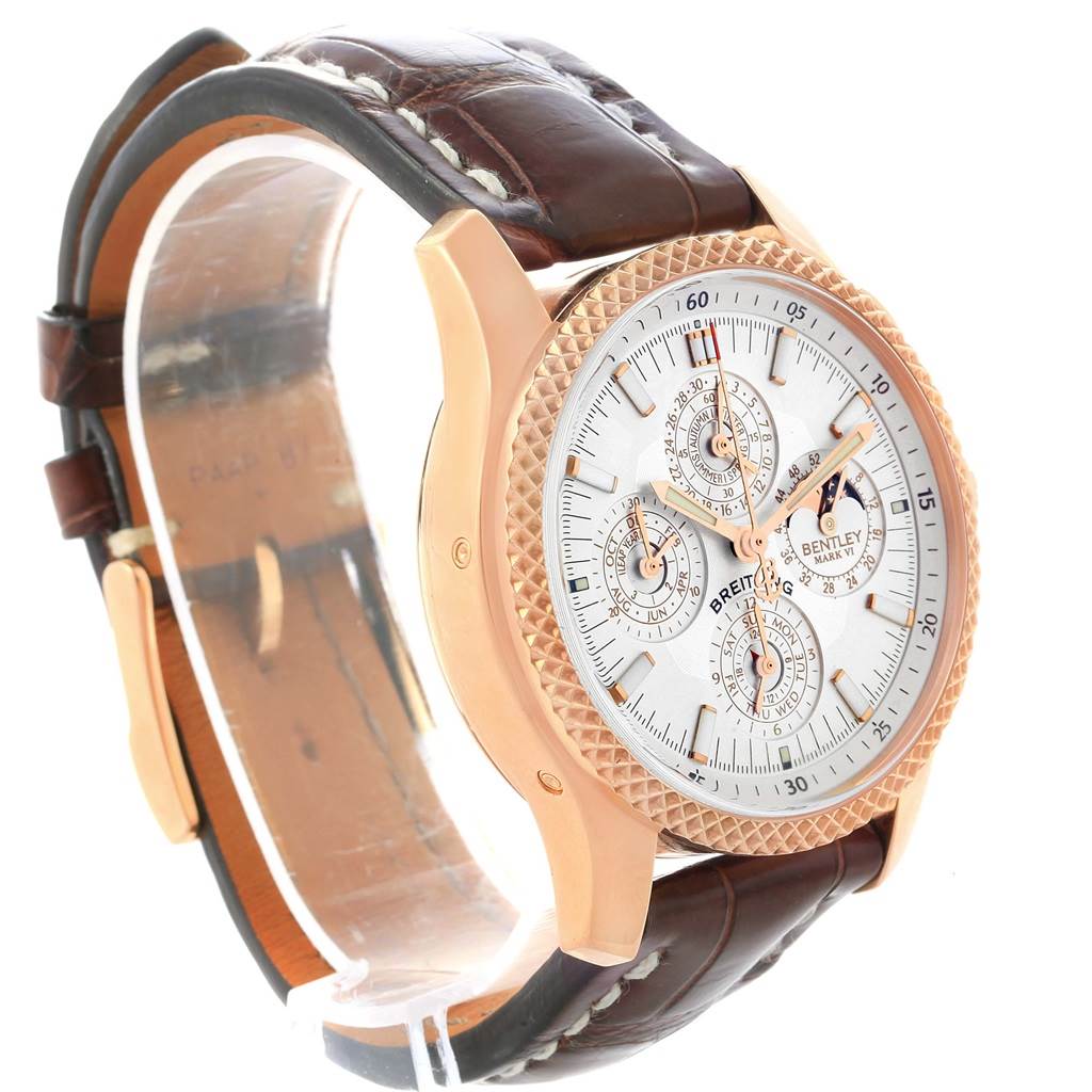 The image shows a side-angle view of the Breitling Bentley H29363 Men's Rose Gold Silver Dial H29363 Men's Rose Gold Silver Dial watch, highlighting its dial, bezel, and leather strap.