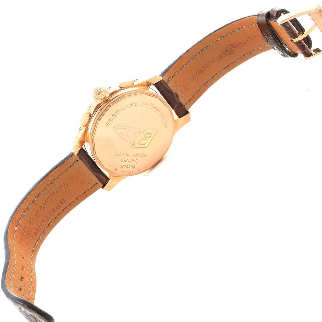 The watch shown is a Bentley model by Breitling; it is viewed from the back, displaying the case back and leather strap.