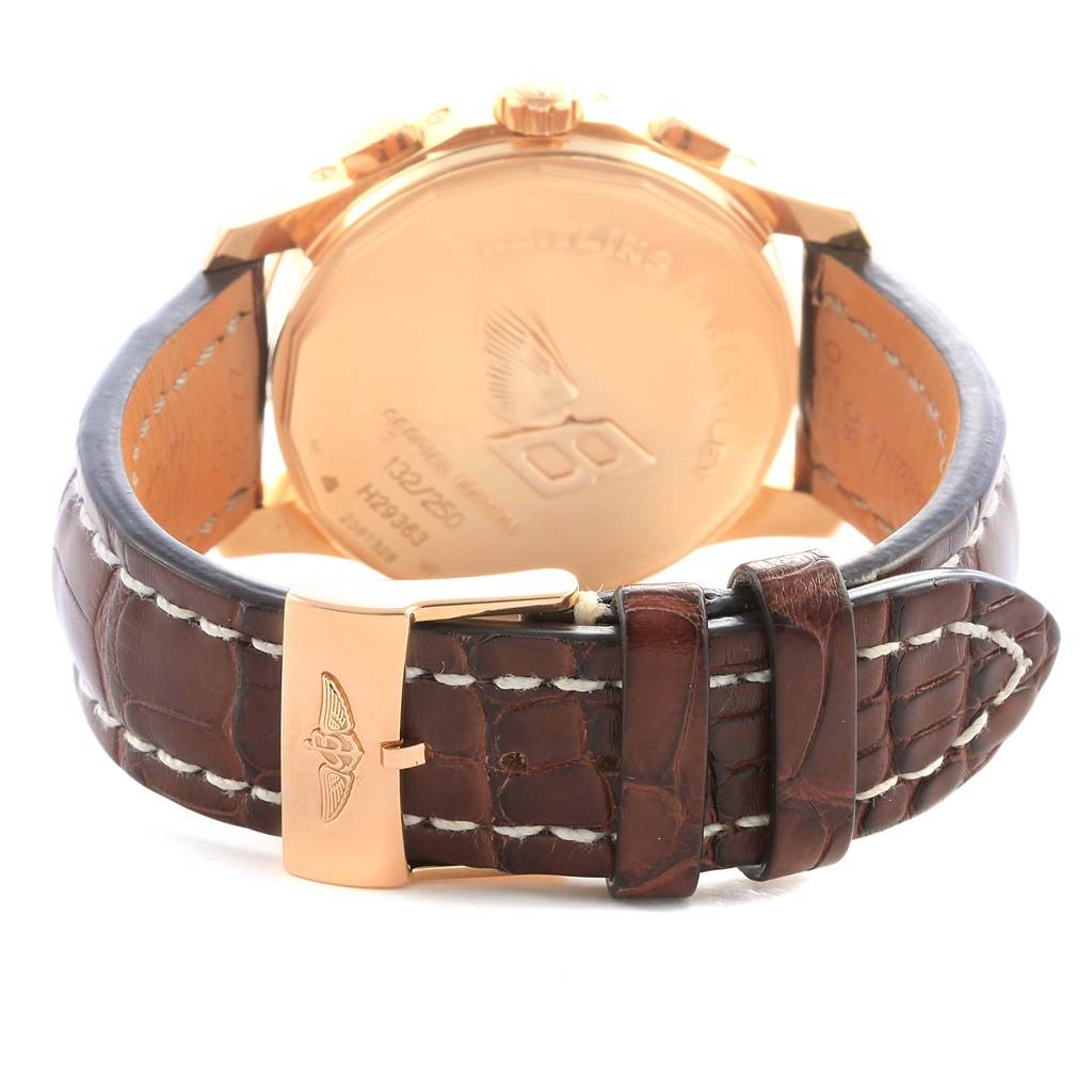 The image shows the back side and clasp of a Bentley model by Breitling with a leather strap and gold buckle.