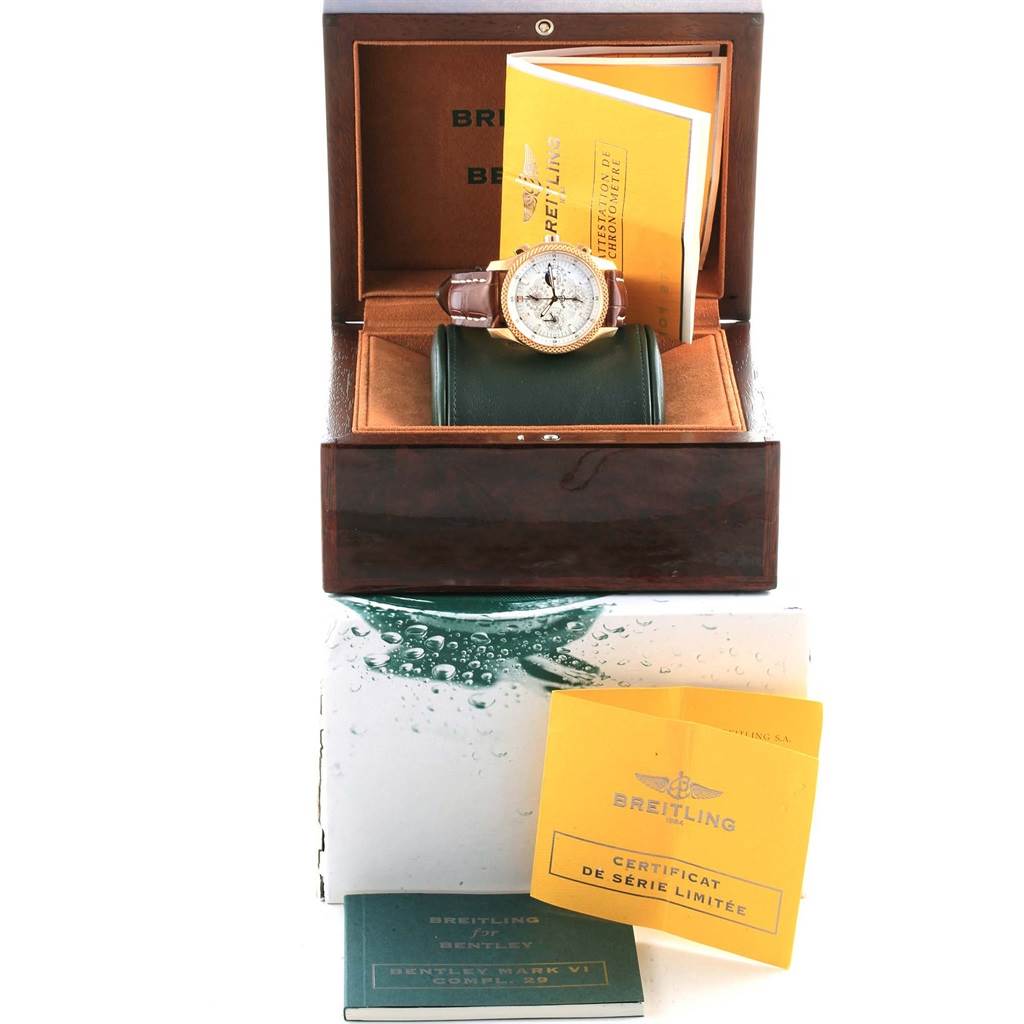 The Breitling Bentley H29363 Men's Rose Gold Silver Dial H29363 Men's Rose Gold Silver Dial watch is shown angled slightly from the front, with its box, limited series certificate, and accompanying booklets.