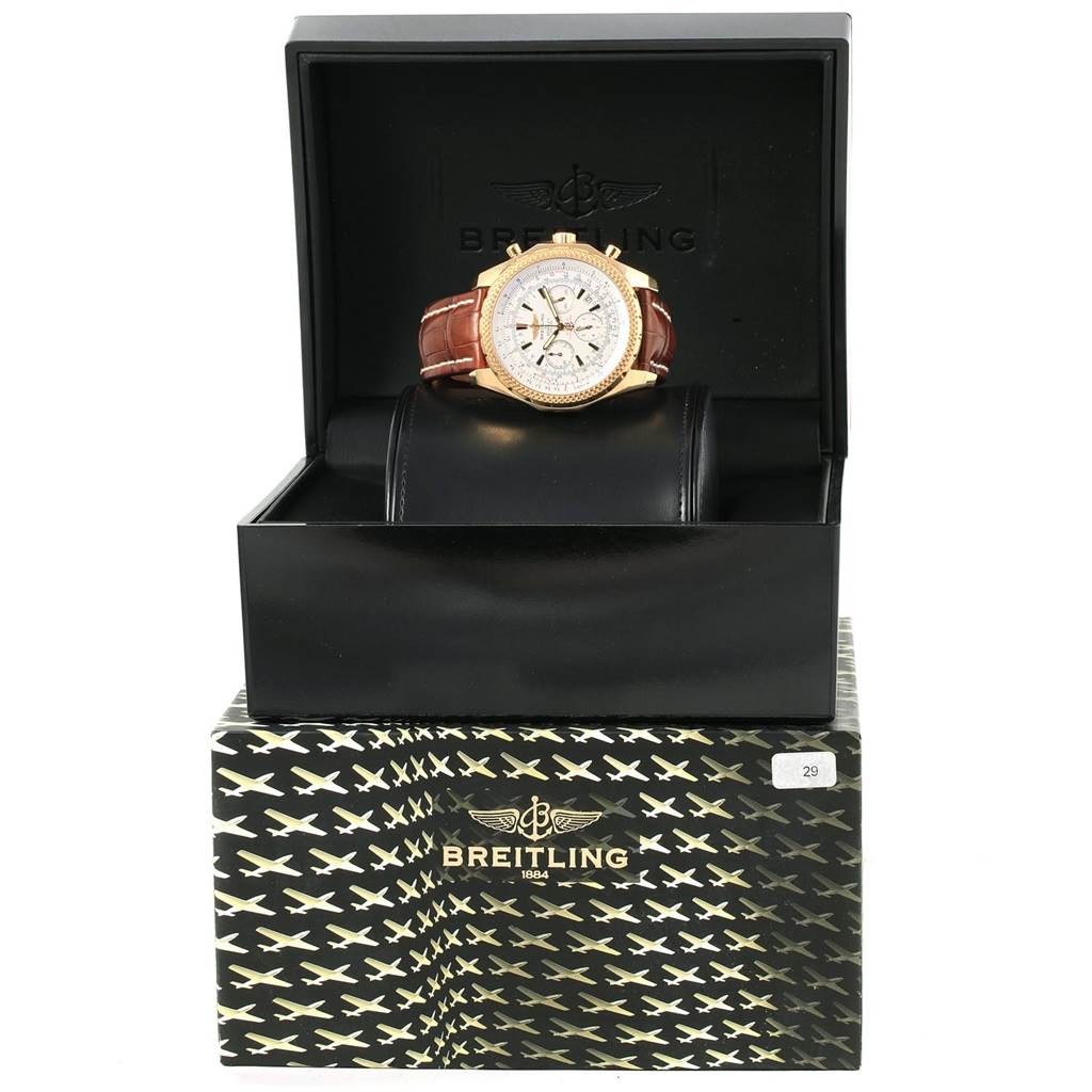 The Breitling Bentley K25362 Men's Steel and Gold (two tone) White Dial K25362 Men's Steel and Gold (two tone) White Dial watch is shown from the front, resting in its open box, revealing the dial and brown leather strap.