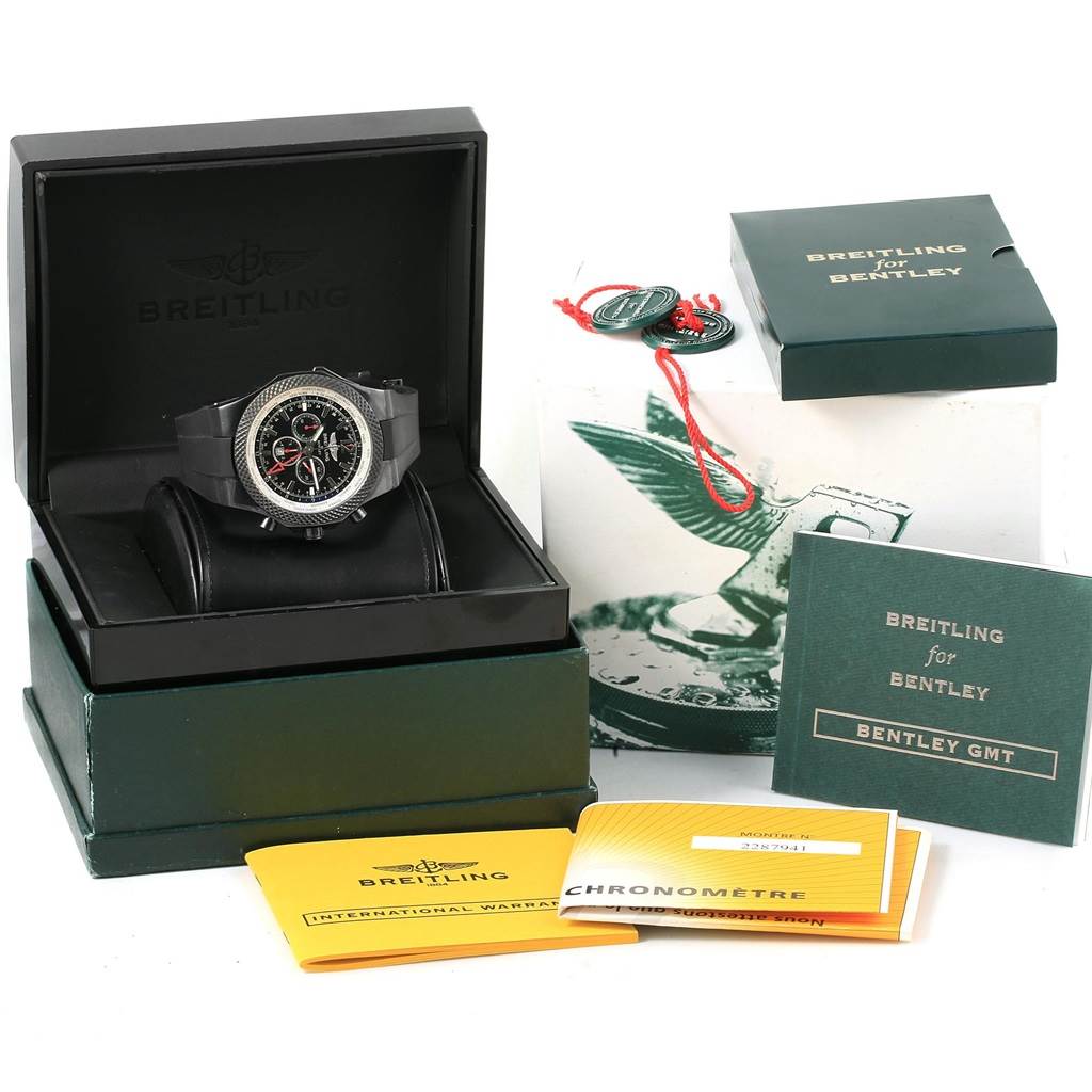 The image shows a Breitling Bentley M47362 Men's Stainless Steel Black Dial M47362 Men's Stainless Steel Black Dial watch in its box, with booklets and tags around it.