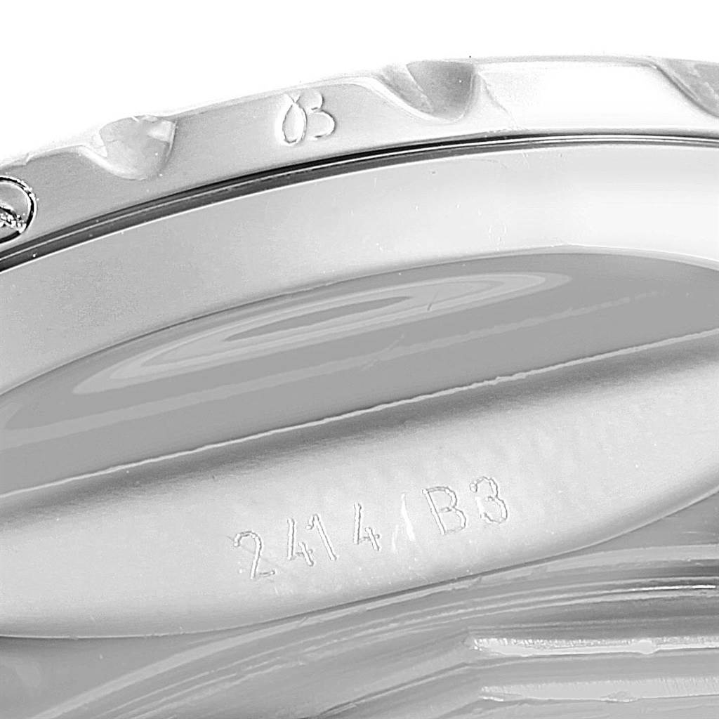 This image displays a close-up of the bezel and casing of a Bentley model by Breitling, with visible serial numbers.