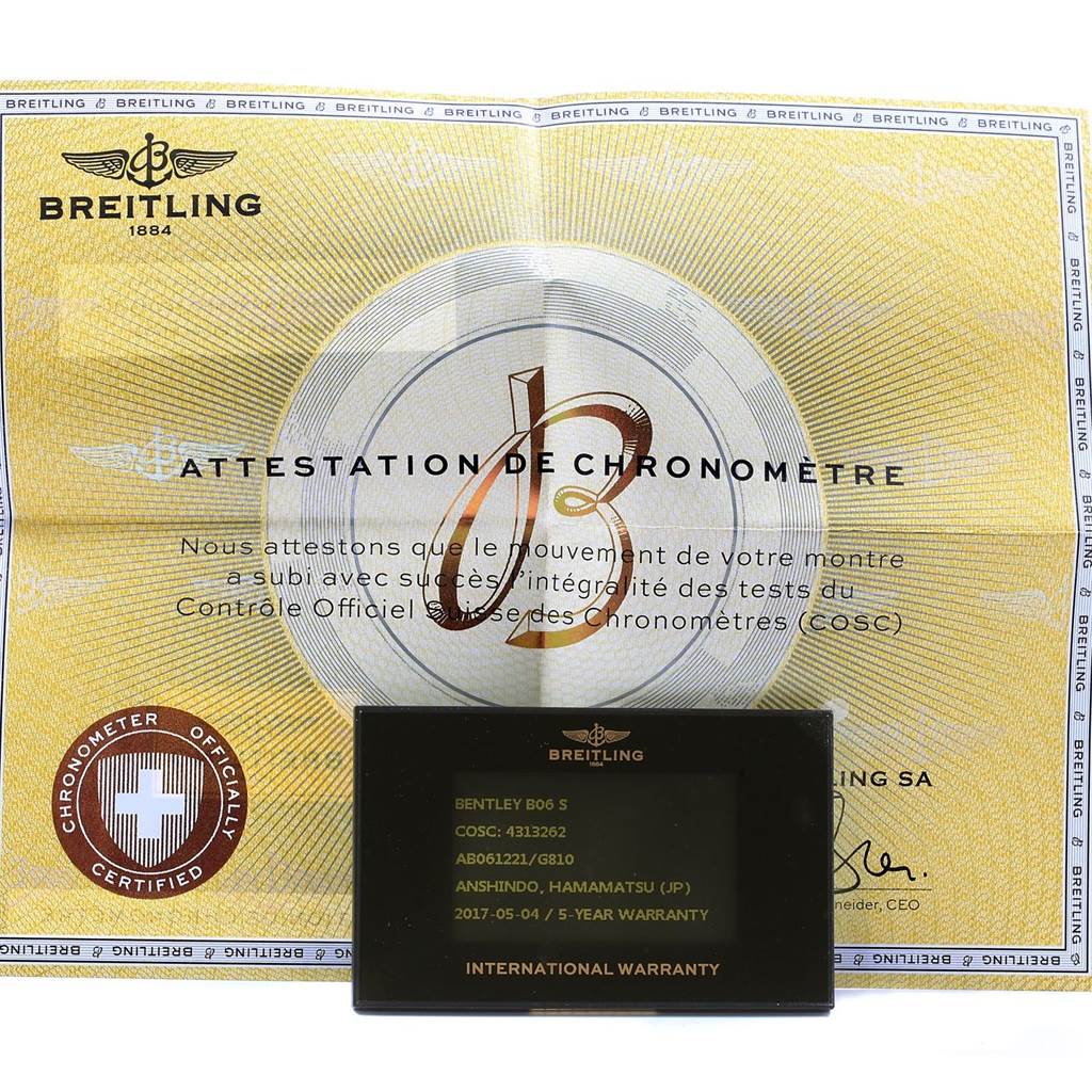 This image shows the certification papers and international warranty card for the Bentley model by Breitling.