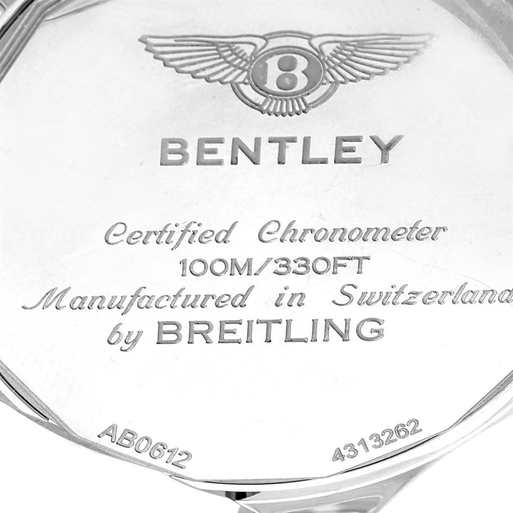 The image shows the back case of a Breitling Bentley AB061221/G810-980A Men
s Stainless Steel Silver Dial AB061221/G810-980A Men
s Stainless Steel Silver Dial watch, displaying engravings and the brand
s logo.