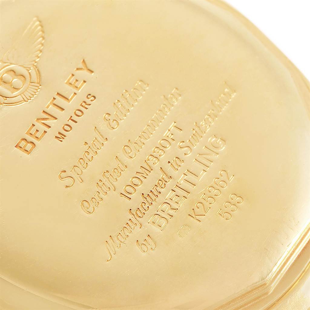 This close-up image shows the gold case back of a Breitling Bentley K25362 Men
s Steel and Gold (two tone) White Dial K25362 Men
s Steel and Gold (two tone) White Dial model watch, highlighting engraved branding and specifications.