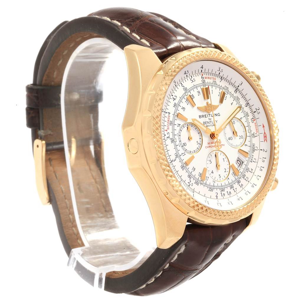 The image shows a Breitling Bentley K25362 Men
s Steel and Gold (two tone) White Dial K25362 Men
s Steel and Gold (two tone) White Dial watch at a three-quarter angle, highlighting the face, bezel, and brown leather strap.