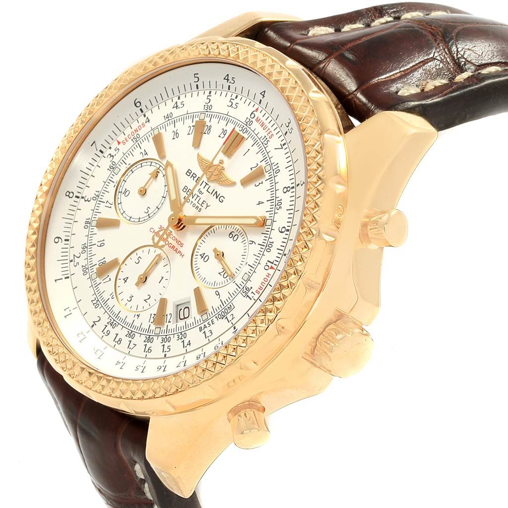 The image shows a Breitling Bentley K25362 Men
s Steel and Gold (two tone) White Dial K25362 Men
s Steel and Gold (two tone) White Dial watch at a slight angle, revealing the dial, bezel, crown, and part of the leather strap.
