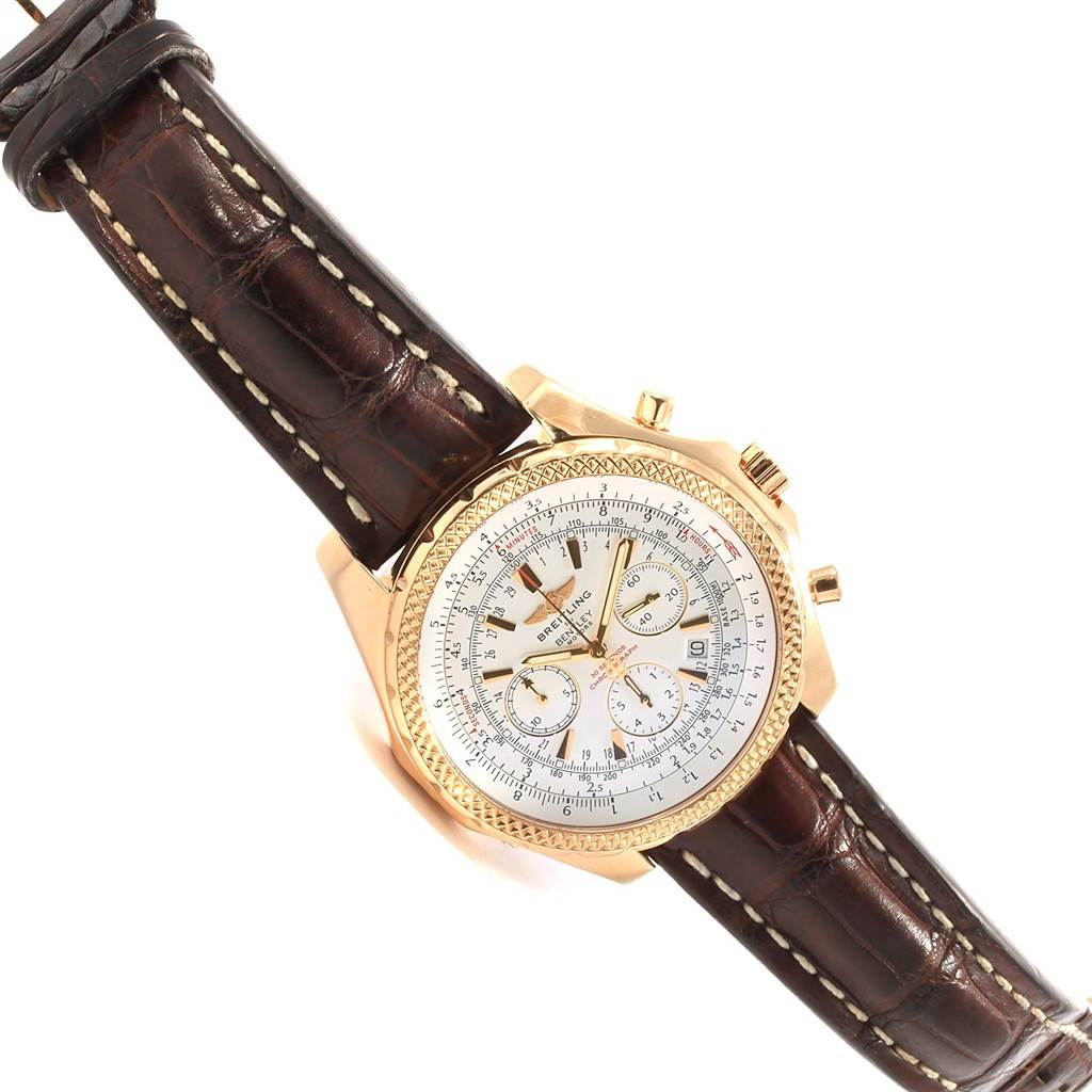 The Breitling Bentley K25362 Men
s Steel and Gold (two tone) White Dial K25362 Men
s Steel and Gold (two tone) White Dial watch is shown in a top-down view, featuring its gold case, leather strap, and detailed dial.