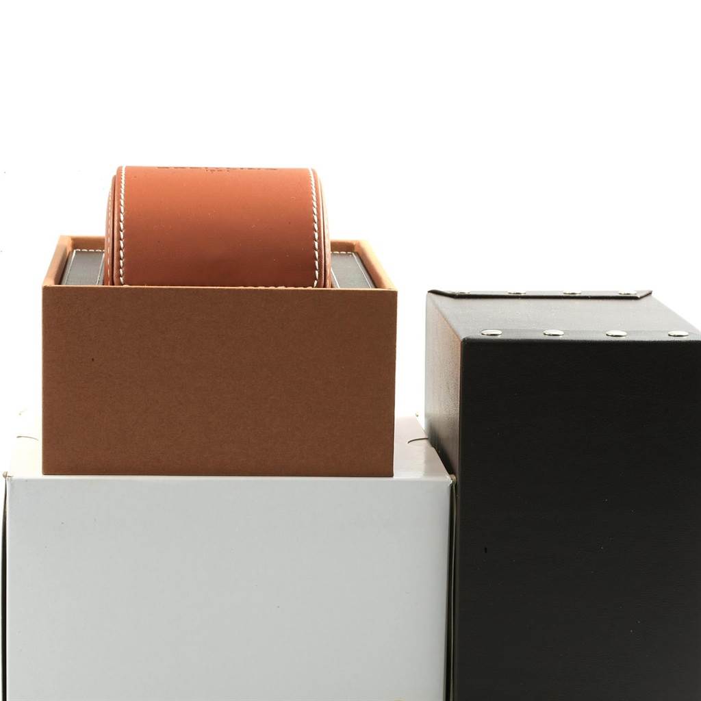 This image shows the packaging box and leather travel case of a Bentley model by Breitling from a front angle.