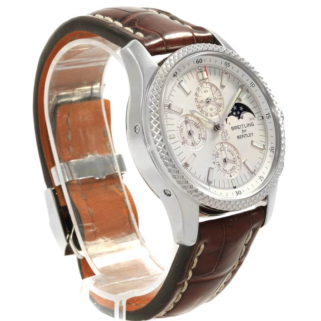 This Breitling Bentley P19362 Men
s Stainless Steel Mother of Pearl Dial P19362 Men
s Stainless Steel Mother of Pearl Dial watch is shown at a 3/4 angle, highlighting its face, bezel, and brown leather strap.
