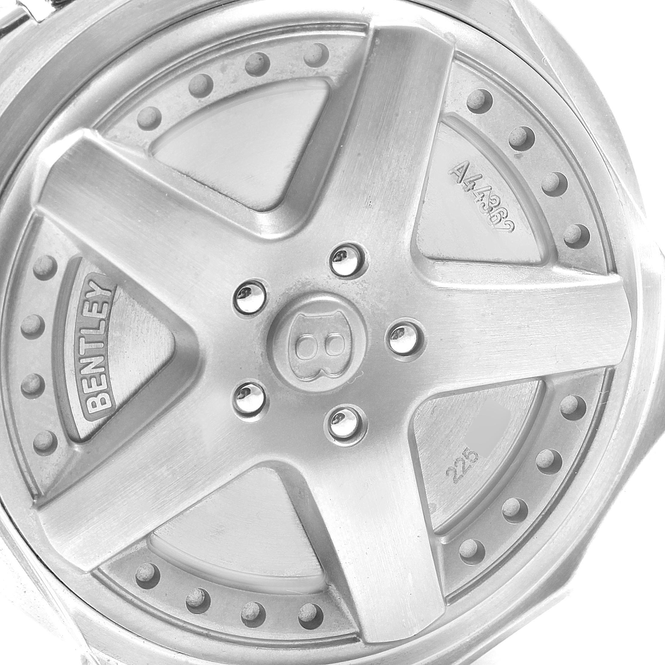 The image shows the back case of a Breitling Bentley A44362 Men's Stainless Steel Silver Dial A44362 Men's Stainless Steel Silver Dial model watch, resembling a car wheel rim design with engraved details.