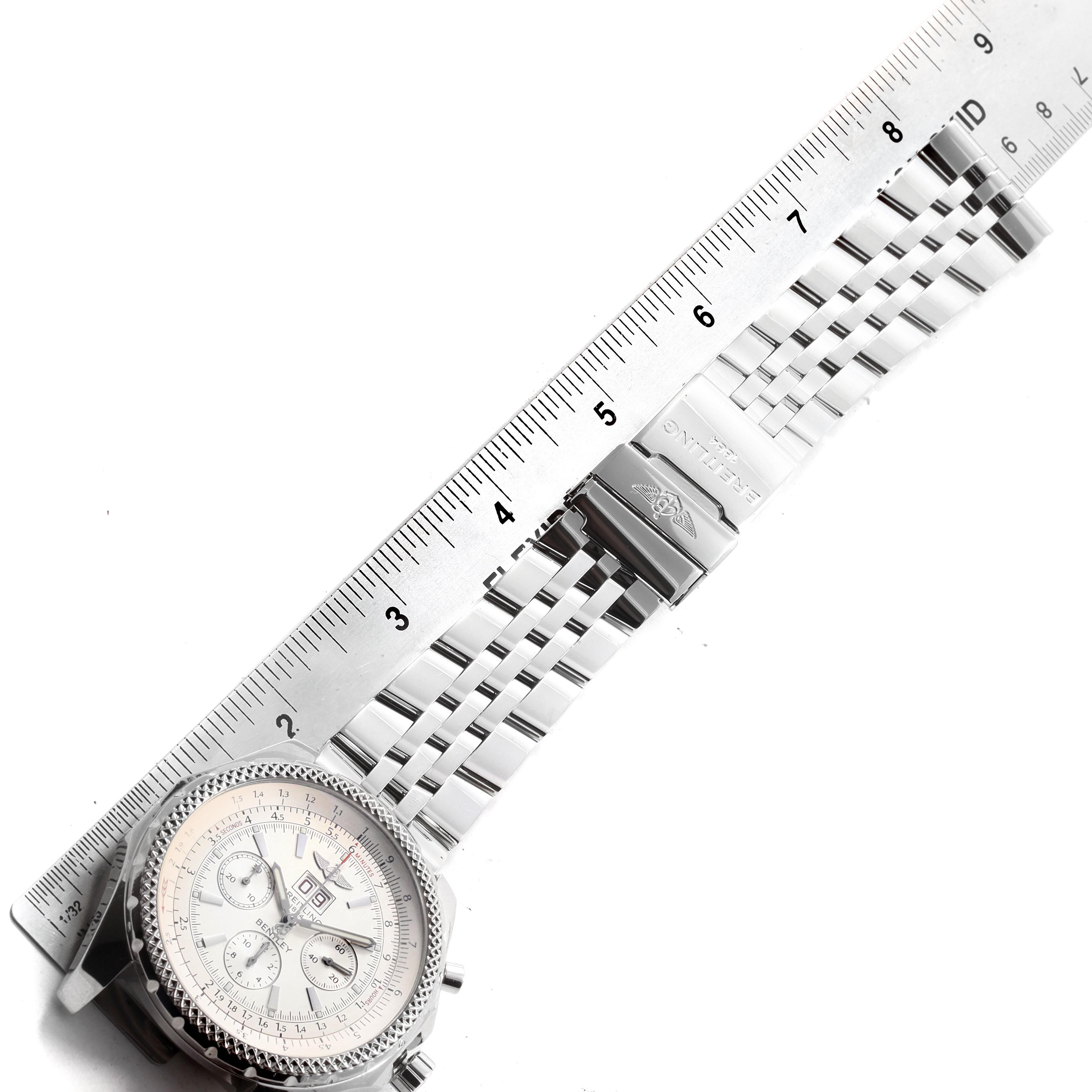 The image shows a Breitling Bentley A44362 Men's Stainless Steel Silver Dial A44362 Men's Stainless Steel Silver Dial watch laid flat with a metal strap, placed next to a ruler, viewed from above.