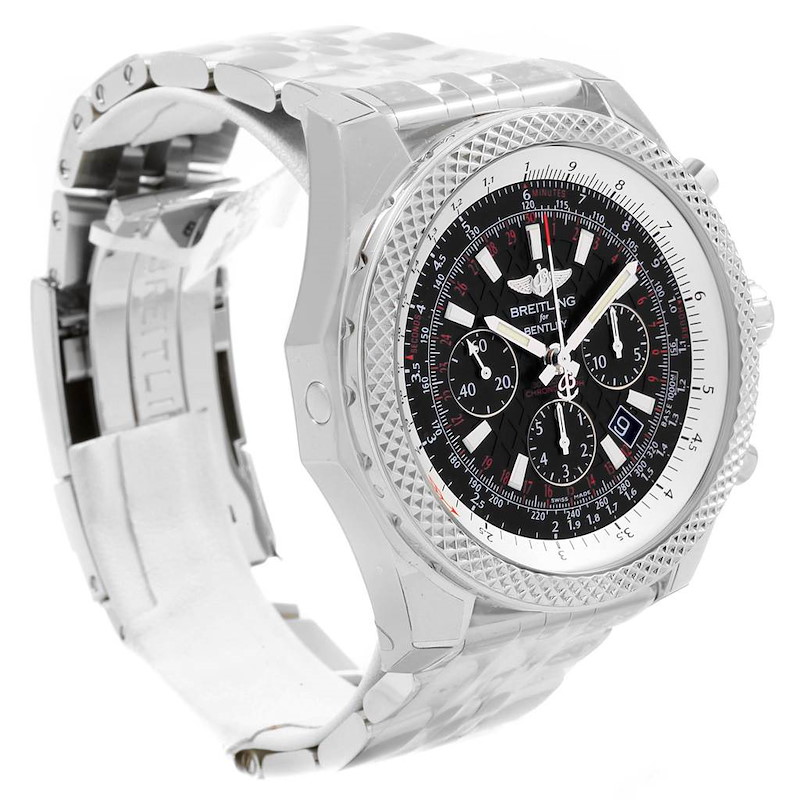 A Breitling Bentley watch is shown at an angle displaying the face, bezel, and part of the metal bracelet.