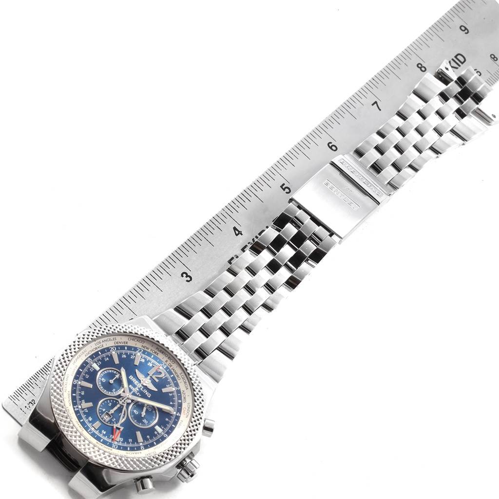 The image shows a top view of a Breitling Bentley A47362 Men's Stainless Steel Blue Dial A47362 Men's Stainless Steel Blue Dial watch, highlighting the face, bezel, and metal bracelet with a ruler for measurement.