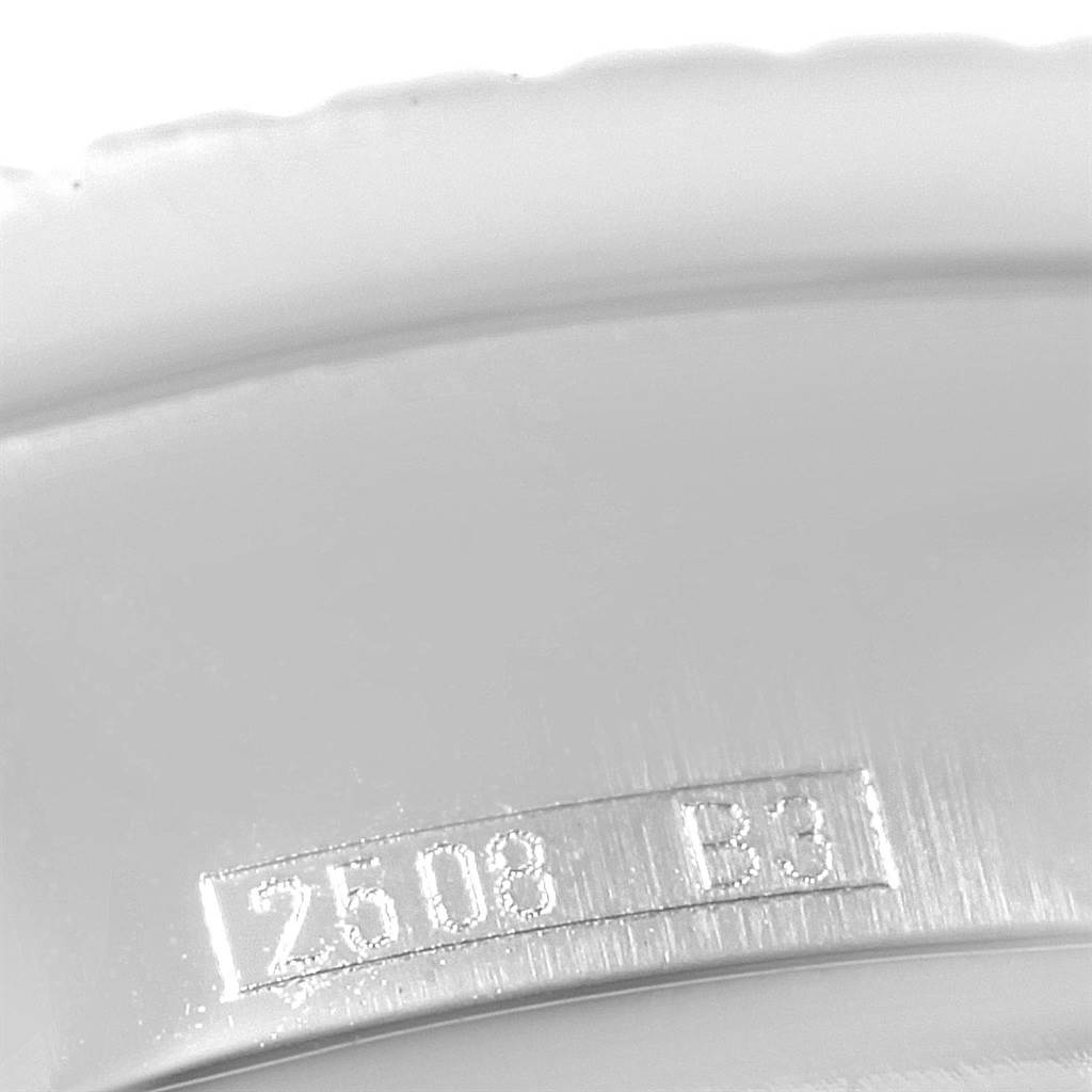 The image shows a close-up of the inner bezel of a Breitling Bentley A47362 Men's Stainless Steel Blue Dial A47362 Men's Stainless Steel Blue Dial watch, featuring engraved markings.