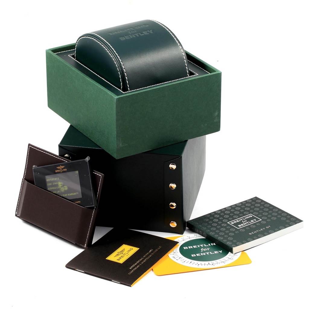 The image shows a packaging box, leather case, and accessories for the Bentley model by Breitling.