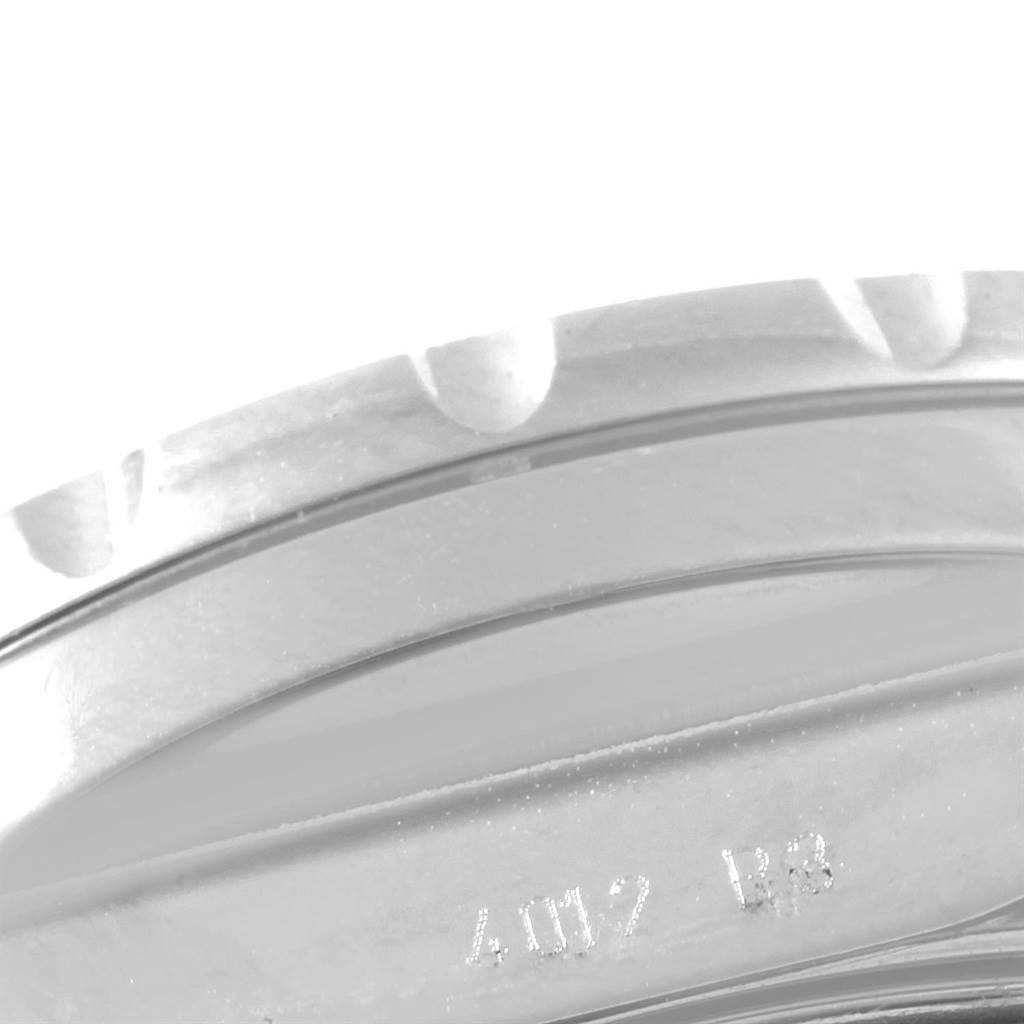 This image shows a close-up of the bezel and part of the case back of a Breitling Bentley A13365 Men
s Stainless Steel Green Dial A13365 Men
s Stainless Steel Green Dial model watch.