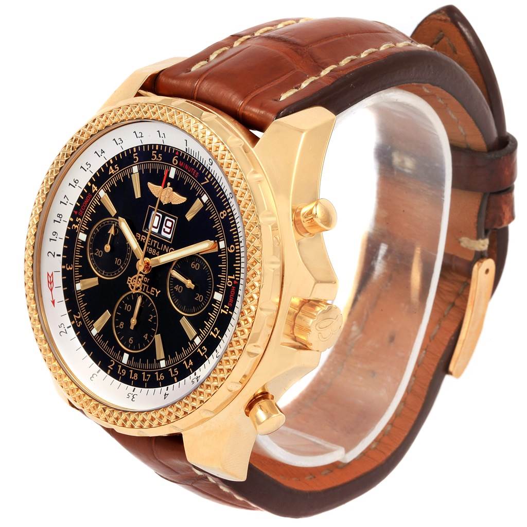 The image shows a side angle of the Breitling Bentley K44362 Men's Yellow Gold Black Dial K44362 Men's Yellow Gold Black Dial watch, highlighting the bezel, crown, dial, and leather strap.